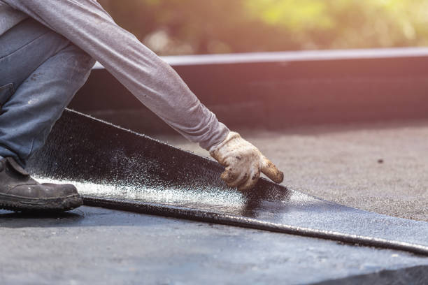 Professional Emergency Waterproofing technician working in Forest City, IA